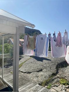 clothes hanging out to dry outside on a sunny day