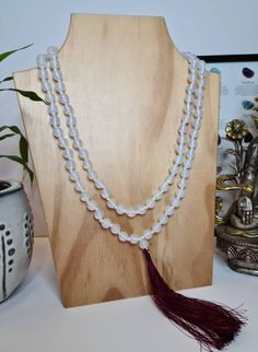 A handmade beautiful White Jade Stone Meditation Mala, Healing necklace, Prayer Beads in 8/10 mm size of beads with blue or maroon color silk tassel. White Jade is a gemstone that holds a lot of meaning and plenty of healing properties, mostly known in her ability to increase or enhance the energy of love in your life, healing, making one feeling peaceful and calm. White Jade is a kind of Tremolite Jade witch is a variety of Nephrite, that's usually white, off-white, or cream in color. The neckl Mala Bead Necklace, Mala Meditation, Meditation Beads, 108 Mala Beads, Healing Necklace, Meditation Stones, White Jade, Jade Stone, Maroon Color