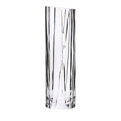 a tall glass vase with thin lines on the bottom and sides, set against a white background