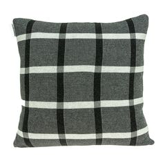 a black and white plaid pillow on a white background