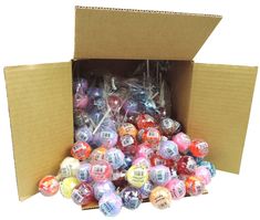 a cardboard box filled with assorted candy