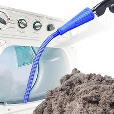 a blue hose is connected to the front of a washing machine with dirt on it