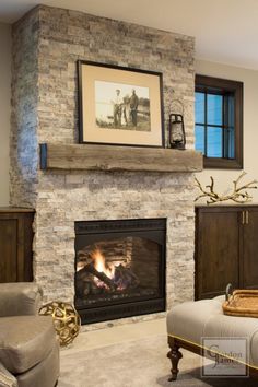 a living room with a fire place and couches