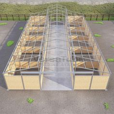 an aerial view of a building with metal frameworks