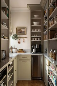 the kitchen is clean and ready to be used as a storage area for food items