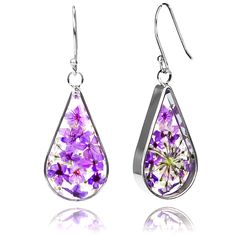 PRICES MAY VARY. 💝【Anti-allergenic material】: 925 sterling silver pressed flower teardrop earrings, your ears are very sensitive, these translucent teardrop resin earrings are gentle and will not irritate the skin.long-lasting color, wear it 💝【Natural dried flowers】: Natural wild dried flowers are integrated with glue. They are both earrings and works of art, a beautiful visual experience. 💝【Purely Handmade】: Each pair of earrings is carefully handmade. These flowers grow on the grasslands of Natural Dried Flowers, Ear Candy, Resin Earrings, Pressed Flower, Dried Flower, Pressed Flowers, Teardrop Earrings, Earrings Jewelry, Earring Gifts