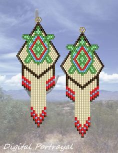 pair of beaded earrings with green, red and white designs hanging from the side