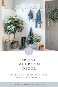 an entryway with plants and rain boots hanging on the wall, and a gray door that says spring mudroom decor