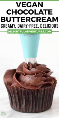 a cupcake with chocolate frosting on top and the words vegan chocolate buttercream creamy, dairy - free delicious