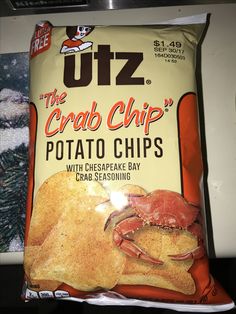 a bag of potato chips with crab seasoning sitting on top of a countertop