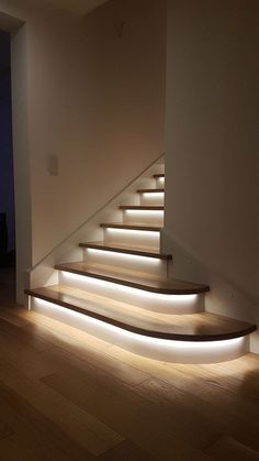 the stairs are illuminated with leds to give them more light than they appear in this photo