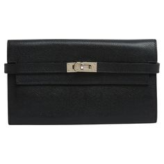 Hermès Kelly model wallet in black leather (Epsom) and silver metal (palladium), 2 large interior compartments separated by a zipped coin purse with pull tab in the Kelly padlock motif, with 6 credit card slots and 2 bill pockets, year 2010 (letter difficult to read). Width 20 cm x height 12 cm x depth 2 cm (empty). The wallet has slight traces of use on the leather, barely patinated at the corners, and the clasp with a few micro scratches but the wallet is in very good condition, perfect as an Hermes Wallet, Hermes Kelly Bag, Suede Slippers, Kelly Bag, Jane Birkin, Shopping Photography, Air France, Gucci Black, Grace Kelly