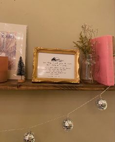 a shelf that has some decorations on it