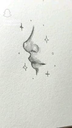 an ink drawing of a woman's face with stars on it