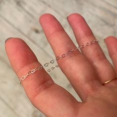 "Sterling Silver Heart Chain Bracelet / Heart Bracelet / Valentines Day Bracelet / Gifts For Her / Valentines Day Gifts / Silver Heart Chain The \"One Heart\" bracelet is made from Sterling Silver heart chain. Please see measurements below to pick your size. XS - 5\" S - 6\" M - 7\" L - 8\" XL - 9\" Every size has a 1\" Sterling Silver cable chain extender so you can customize the length to ensure the perfect fit. I am happy to make a custom size, please message me ♥  ♥ Check out the rest of my shop ♥ https://www.etsy.com/shop/GypsyDustJewelry ♥ Follow @GYPSYDUSTJEWELRY on Instagram, Facebook and Pinterest for updates, inspiration and exclusive first looks at one of kind pieces! ♥ Use the hashtag #GYPSYBABE on social media to show us how you wear it. ♥ Please message me for custom sizes an Valentines Day Bracelet, Heart Chain Bracelet, Bracelet Valentines, Silver Heart Bracelet, Bracelet Heart, Small Bracelets, Valentines Day Gifts, Silver Chain Style, Heart Chain