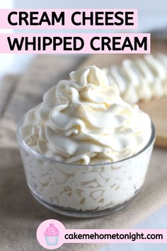 a bowl filled with whipped cream on top of a table