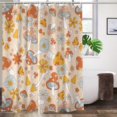 a shower curtain with mushrooms and flowers on it in front of a bathtub next to a window