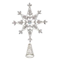 a metal snowflake ornament with leaves and spirals hanging from it's side