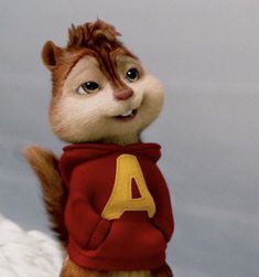 the chipmunz is wearing a red shirt and yellow letters on it's chest