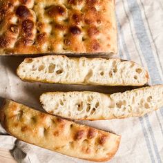 three pieces of bread sitting on top of a table