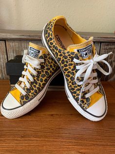 "Converse Yellow and Black (Personally Designed) \"Cheetah\" Pattern with \"MEOW\" in yellow stitching on the side of the canvas (Low-Top) Lace-Up Sneakers - Style Code 146639C (Size 7) Brand: Converse Style: Sneakers  Color: Yellow and Black Cheetah Pattern Style Number: 146639C They are in very good (Lightly Used) condition, (see photos)." Black And Yellow Shoes, Converse Yellow, Cheetah Pattern, Vintage Converse, Converse Star, Converse Style, Yellow Shoes, Style Sneakers, Womens Tie