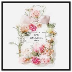 a chanel perfume bottle with pink flowers and a bow on the front, surrounded by greenery