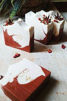 three pieces of chocolate sitting on top of a table