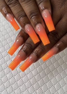 #orange #nails #nailart #nailpolish #naildesign #acrylicnails #longnails #nailideas #nailartdesigns #orangenailpolish #orangenails #baddienails Neon Nails Acrylic Coffin Long, Bright Orange Ombre Nails, Rappers Nails, Orange Tapered Square Nails, Bright Ombré Nails, Orange Ombre Acrylic Nails, Orange Square Acrylic Nails, Bright Summer Acrylic Nails Square, Orange Nail Ideas Summer