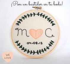 a cross stitch pattern with the word mom written on it and a heart in the center