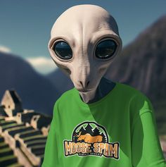 an alien wearing a green shirt with mountains in the background