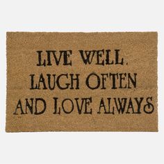 a door mat with the words live well laugh often and love always written on it