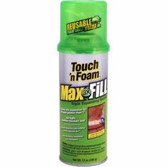 a green spray can with the words, touch n foam max - full on it