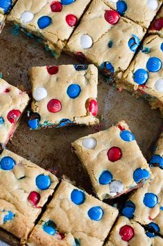 red, white and blue cookie bars on a baking sheet