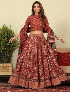 🔥Special Chaniya Choli Collection🔥 Bagru Hand Block Printed Designer Top, Skirt With Mulmul Printed Dupatta. Pure Cotton Fabric Product specifications :- - Fabric :- Cotton - Print :- Hand Block Print     Size :- - Top Sizes :- Medium - 38 inches; Large - 40 inches;     X-Large - 42 inches; 2X-Large - 44 inches; 3X-Large - 46 inches; - Top length :- 16-17 inch - Skirt length :- 40 inch - Skirt Flair :- 5.50 Mtr. (28 Kali) - Dupatta size :- 2.50 Mtr. Occasion :- Evening Wear, Cocktail, Festive wear, Party Wear, Wedding wear, Dating, Banquet, Garba Night, Formal Wear and Perfect gift for your Sister, Mother, Friend or Loved Ones. Note :-  Customization :- Made to Measure According to Your Size. Any Other customization According to Your Choice. THANKS! A beautiful Hand Block Print Cotton Le Bohemian Anarkali Set For Navratri With Printed Motifs, Anarkali Choli With Printed Motifs For Festivals, Anarkali Choli With Printed Motifs For Diwali, Sharara With Kalamkari Print For Festivals, Kalamkari Print Sharara For Festivals, Bohemian Sharara With Printed Motifs For Navratri, Bohemian Fitted Sharara With Printed Motifs, Red Semi-stitched Bohemian Anarkali Set, Fitted Bohemian Sharara With Printed Motifs