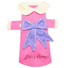 a pink and blue dog sweater with a bow on the collar that says girl gnomes