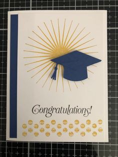 congratulations card with blue and gold graduation cap