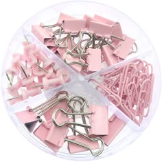 pink binders and clips in a plastic container