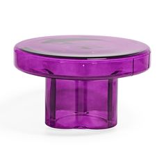 a purple round table with a glass top