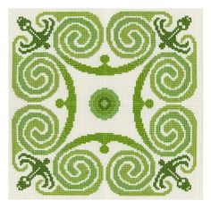 a cross stitch pattern with green and white swirls in the center, on a white background