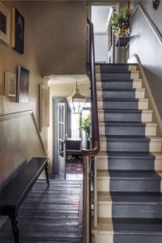 the stairs in this house are painted black