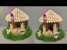 two bird houses made out of rocks and grass