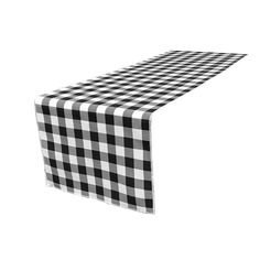 a black and white checkered table runner