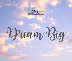 the words dream big against a blue sky