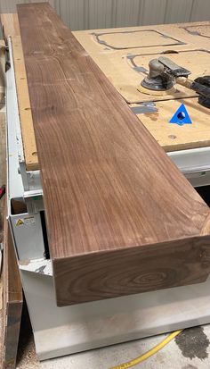 a wooden table being built in a shop