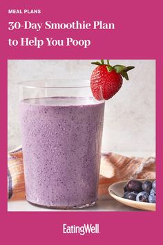 a smoothie in a glass with a strawberry on top and the words, 50 - day smoothie plan to help you poop