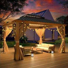 a gazebo with curtains and lights around it on a deck at night or dawn