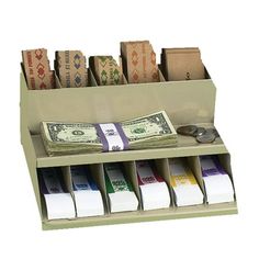 money is sitting on top of an organizer