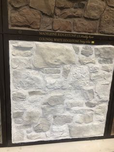 a stone wall with a plaque on it