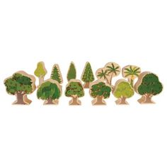 wooden cutouts of different trees and shrubs