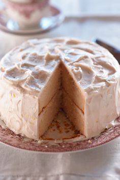 a cake that has been cut in half on a plate